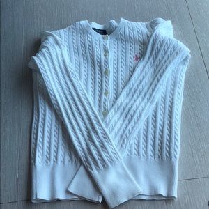 A white polo sweater